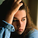 Girl leaning on hand
