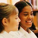 Two girls in library